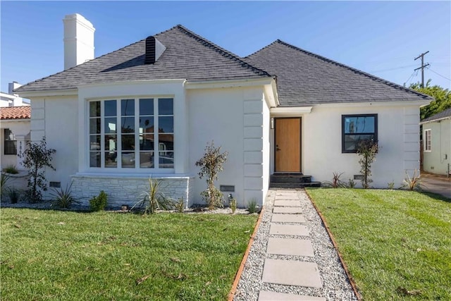 view of front of house featuring a front yard