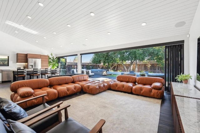 living room featuring wooden ceiling and high vaulted ceiling