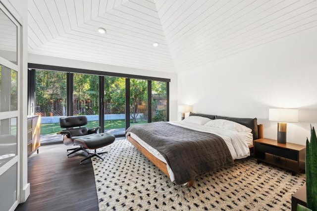 bedroom with hardwood / wood-style flooring and access to exterior