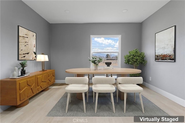 dining area featuring light hardwood / wood-style floors