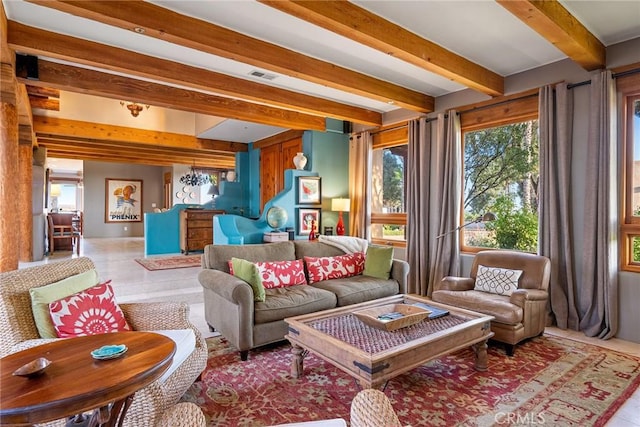 tiled living room featuring beam ceiling