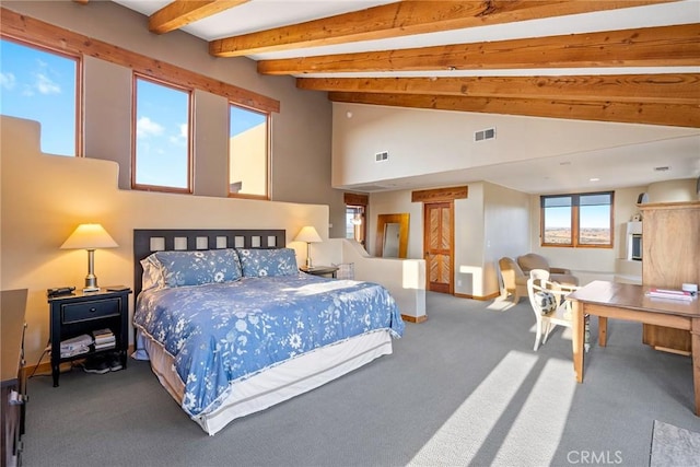 bedroom featuring beam ceiling, high vaulted ceiling, and carpet