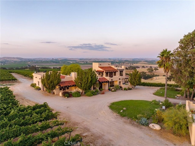 view of aerial view at dusk