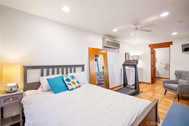 bedroom with an AC wall unit