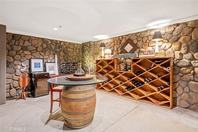 wine area with concrete floors