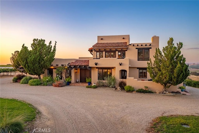 view of adobe home