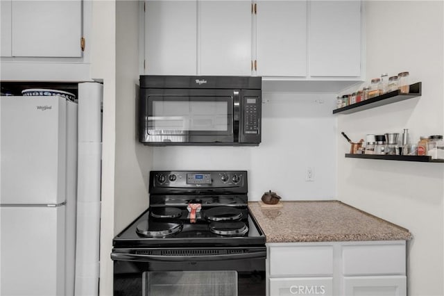 kitchen featuring white cabinetry and black appliances