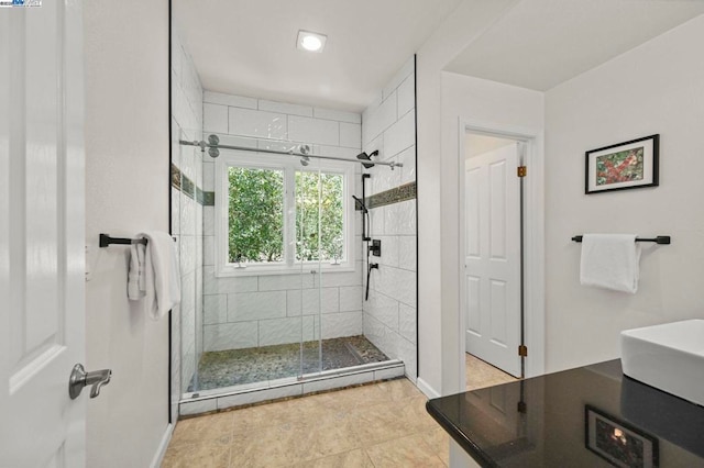 bathroom featuring walk in shower, a baseboard radiator, and sink