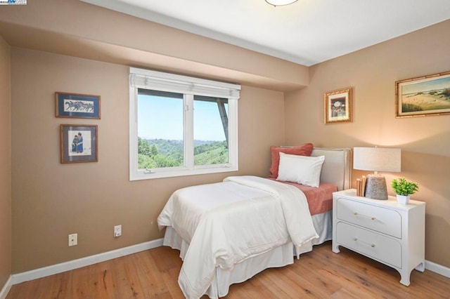 bedroom featuring light hardwood / wood-style flooring