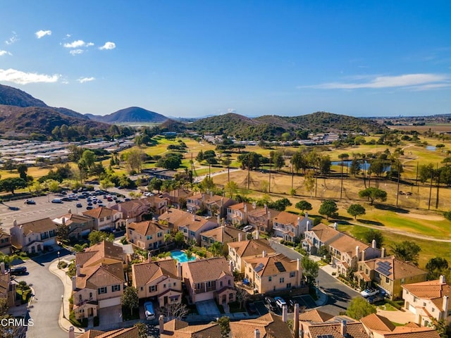 drone / aerial view featuring a mountain view