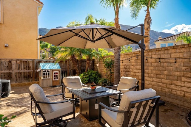 view of patio featuring a mountain view