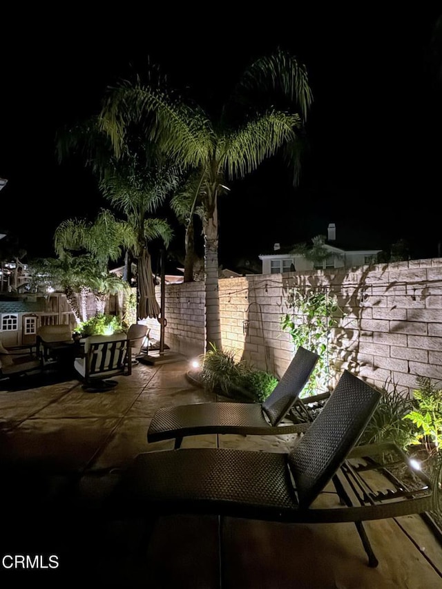 view of patio at twilight