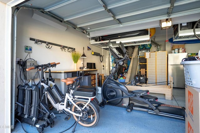 garage with stainless steel fridge