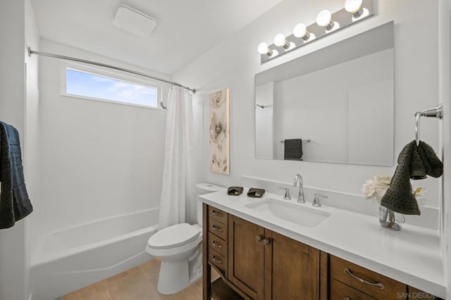 full bathroom featuring vanity, tile patterned flooring, toilet, and shower / bath combo with shower curtain