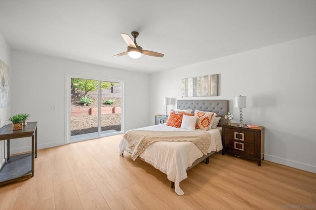 bedroom featuring ceiling fan, light hardwood / wood-style floors, and access to outside