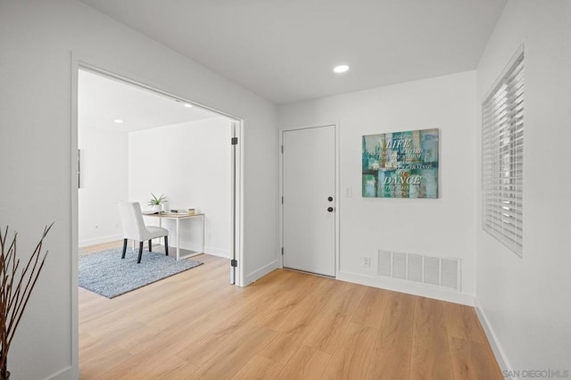 entrance foyer featuring light hardwood / wood-style floors