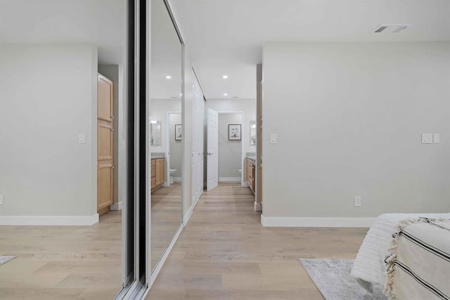 corridor featuring light wood-type flooring