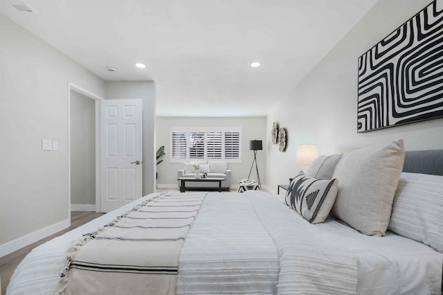 bedroom featuring wood-type flooring