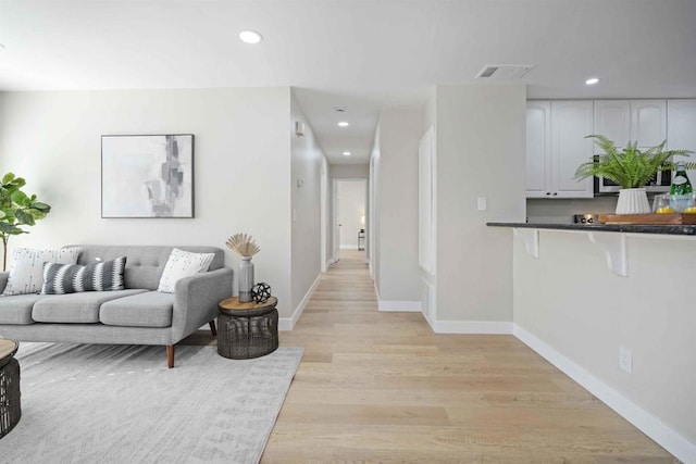 living room featuring light wood-type flooring