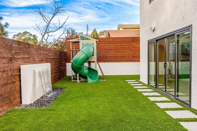 view of yard with a playground