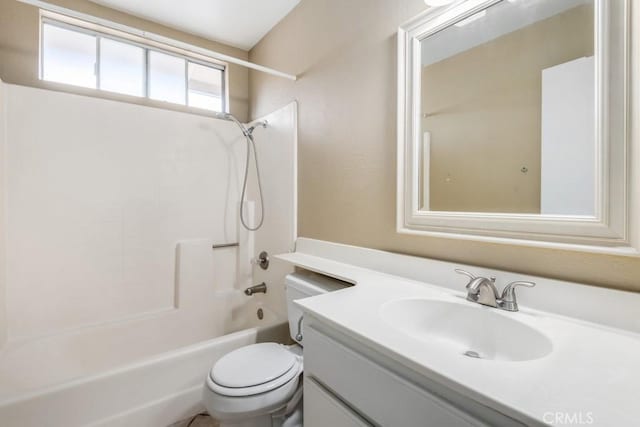 full bathroom featuring vanity, shower / washtub combination, and toilet