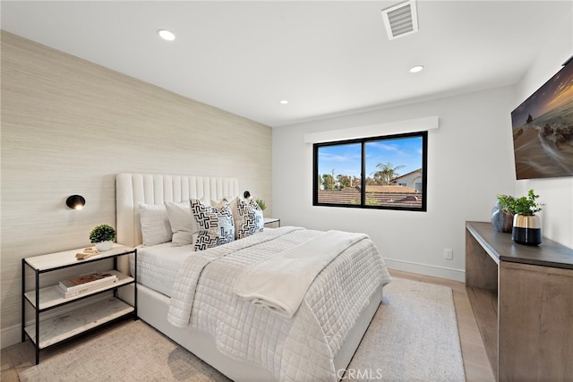 bedroom featuring light wood-type flooring