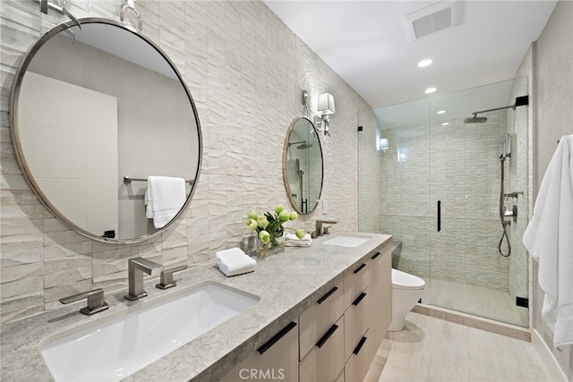 bathroom featuring toilet, walk in shower, tile walls, backsplash, and vanity