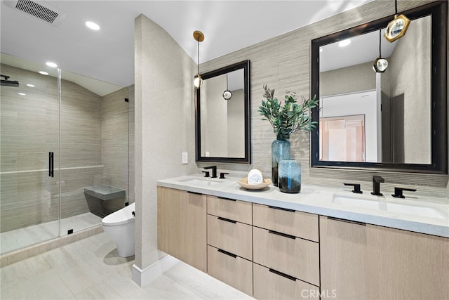 bathroom featuring toilet, vanity, an enclosed shower, and lofted ceiling