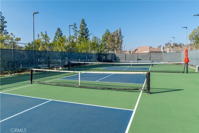 view of sport court featuring basketball court