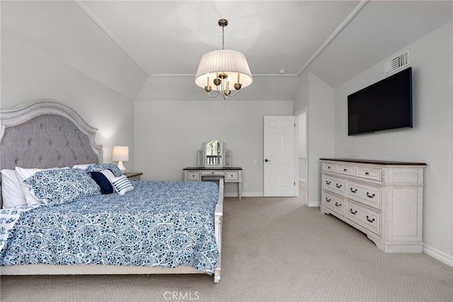 carpeted bedroom featuring a notable chandelier and vaulted ceiling