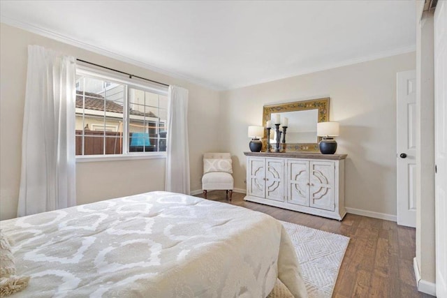 bedroom featuring wood-type flooring and ornamental molding