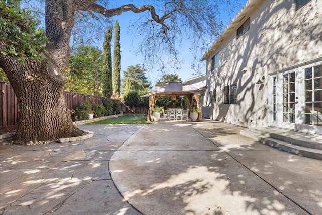 view of patio featuring a gazebo and french doors