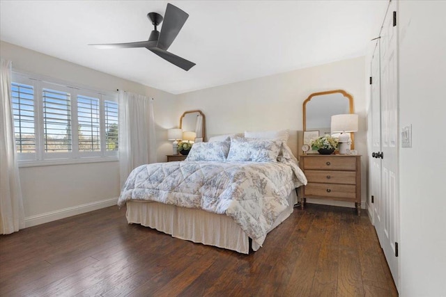 bedroom featuring dark wood-type flooring and ceiling fan