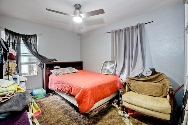 bedroom featuring ceiling fan