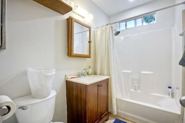 full bathroom featuring vanity, shower / tub combo with curtain, tile patterned floors, and toilet