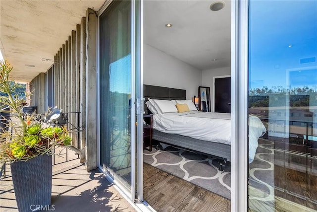 bedroom featuring hardwood / wood-style floors