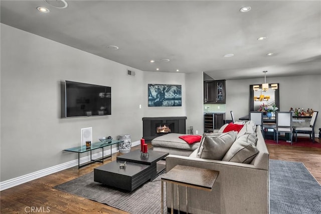 living room featuring dark hardwood / wood-style floors