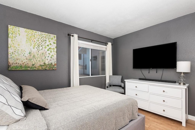 bedroom featuring light hardwood / wood-style flooring