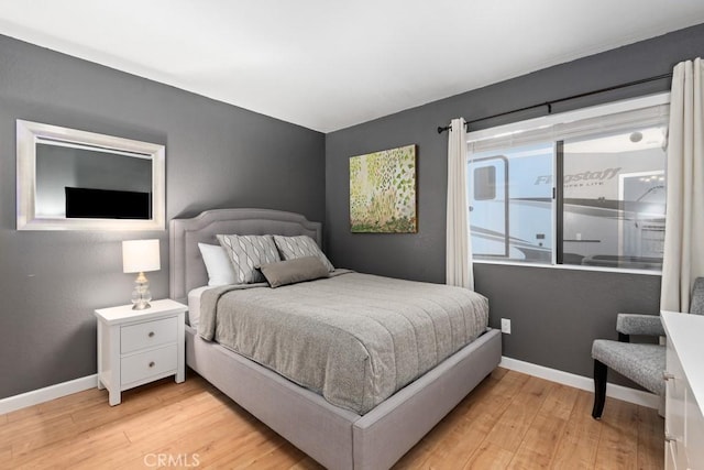 bedroom featuring light wood-type flooring