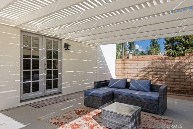 view of patio / terrace featuring a pergola, outdoor lounge area, and french doors