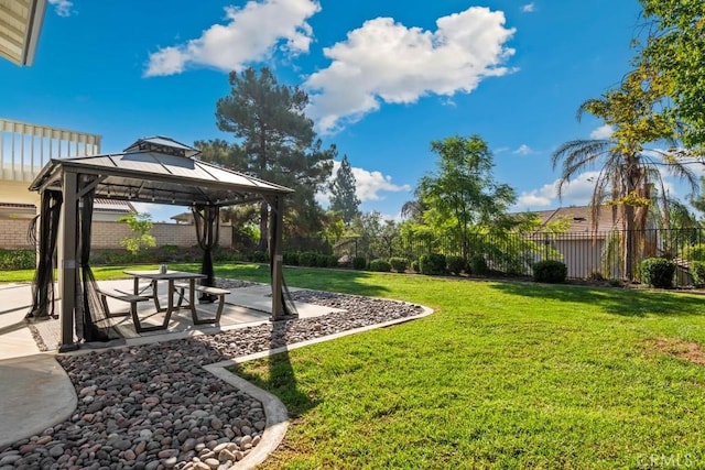 view of yard featuring a gazebo and a patio