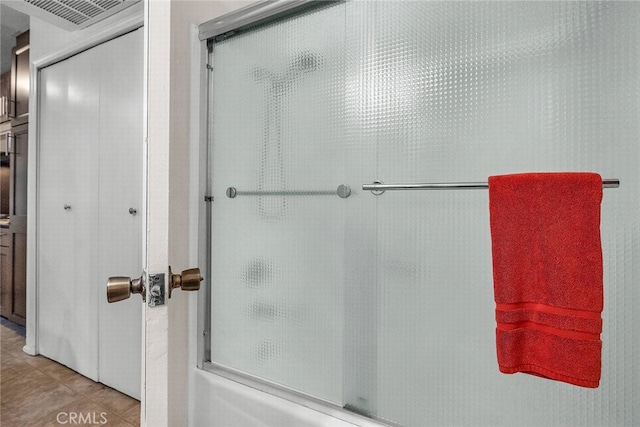 bathroom with tile patterned flooring