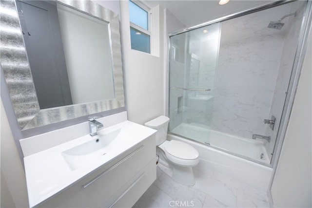 bathroom with toilet, shower / bath combination with glass door, marble finish floor, and vanity