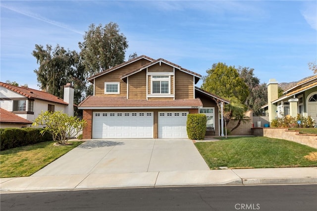 view of front of home featuring a garage and a front yard