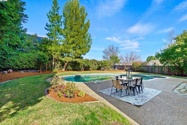 view of pool featuring a patio and a yard