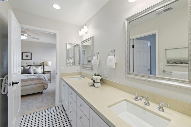 bathroom featuring vanity and ceiling fan