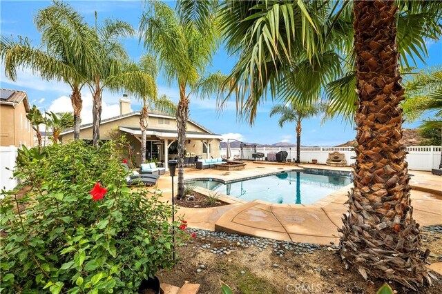 view of pool with a patio