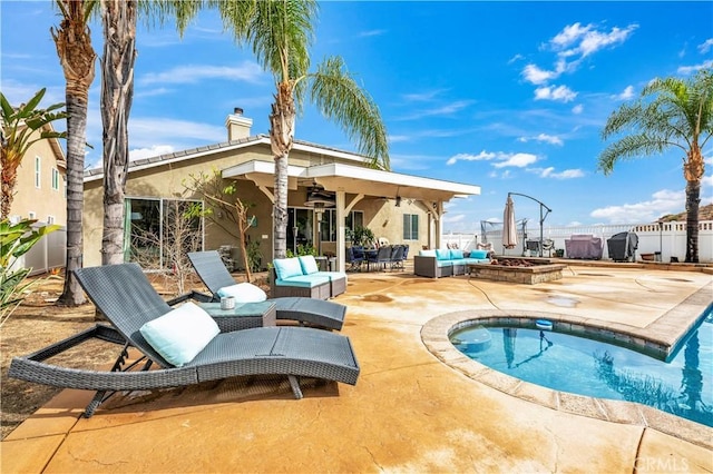 view of swimming pool with an outdoor hangout area, ceiling fan, and a patio area