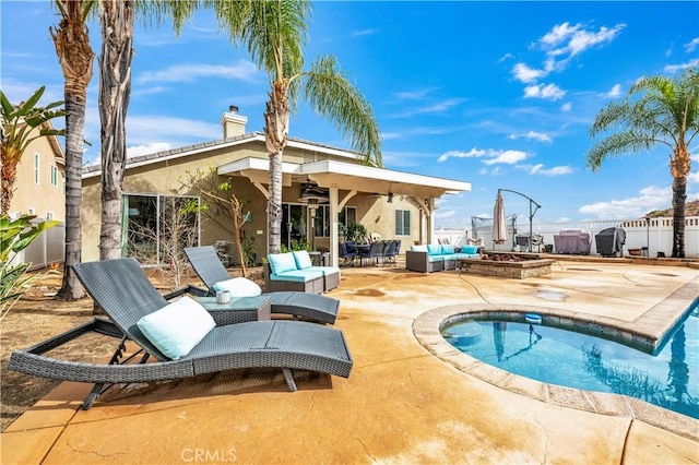 view of pool featuring a fenced in pool, fence, an outdoor hangout area, a patio, and a ceiling fan