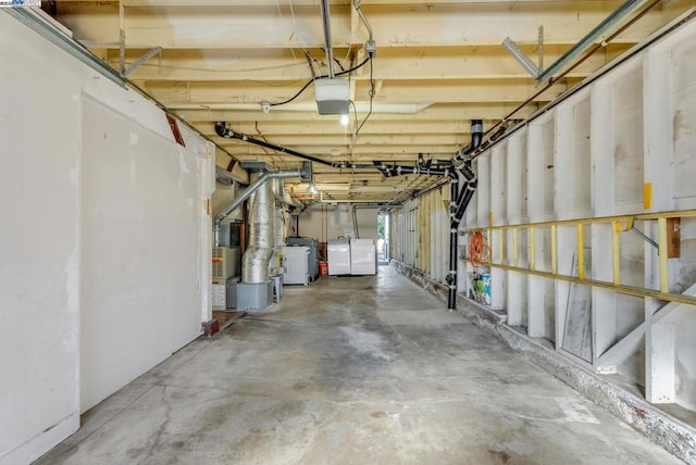 basement with washer and clothes dryer